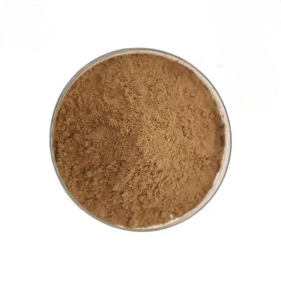 Brown powder in a round container on a white background